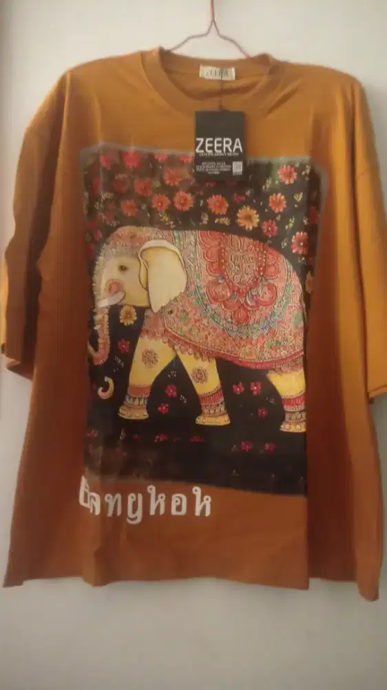 Kaos Zeera, atasan ,