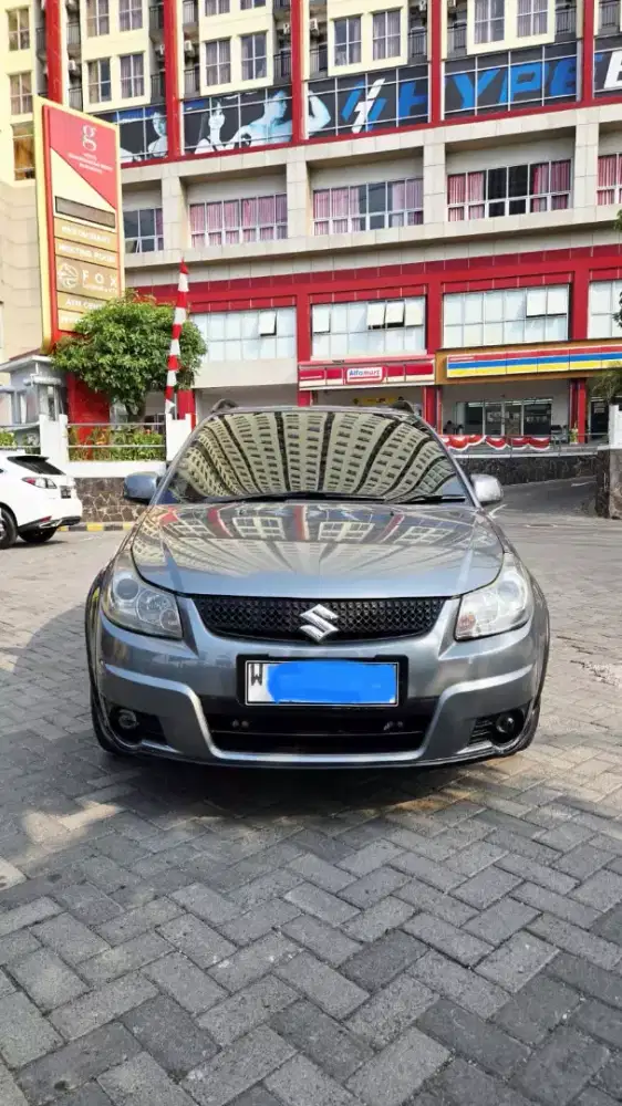 Dijual mobil suzuki x over