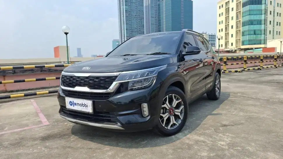 DP 11 JT Kia Seltos 1.4 EX Plus Bensin-AT Hitam 2022
