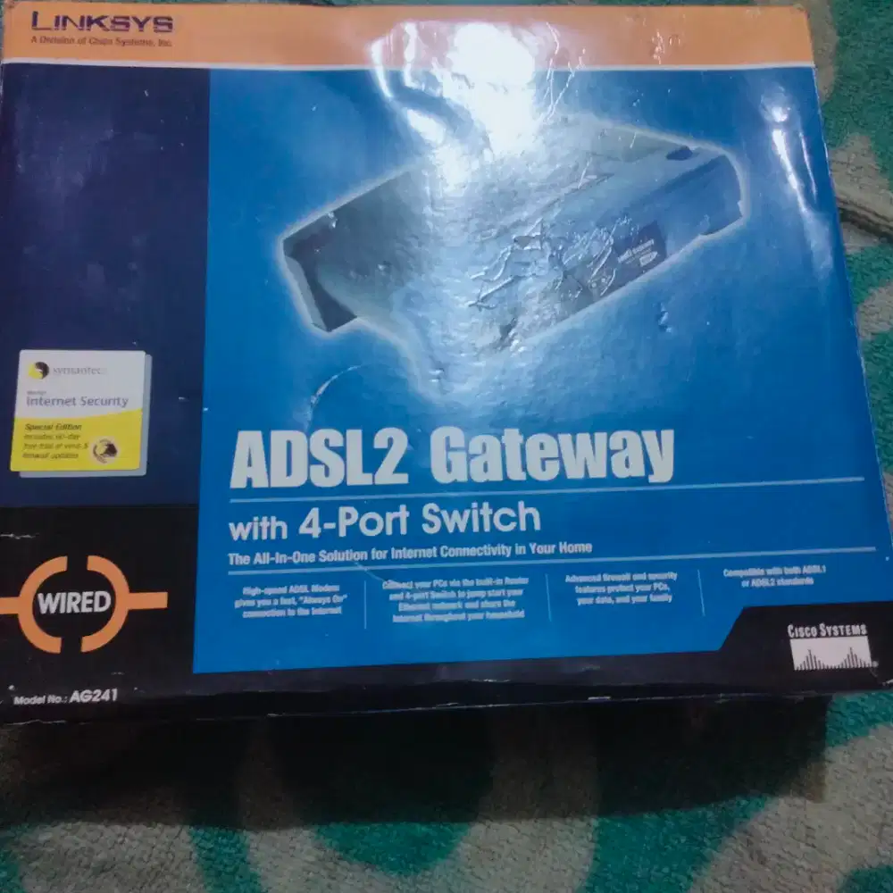 ADSL2 Gateway dengan 4-Port Switch (Model No. AG241).