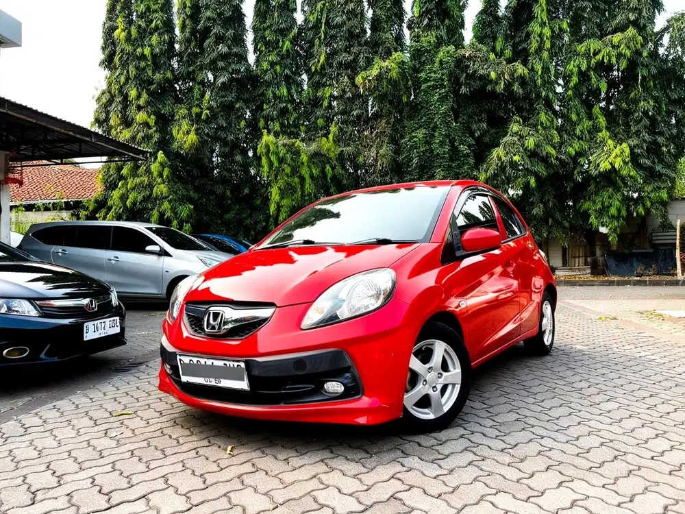 DP 10 JT HONDA BRIO E AT 2014 RED EDITION ANTIK