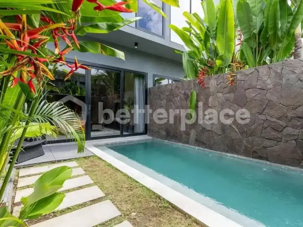 Prestigious 4-Bedroom Canggu Villa with Elegant Enclosed Living Spaces, Luxury Amenities, and Strong Real Estate Investment Opportunity in Bali