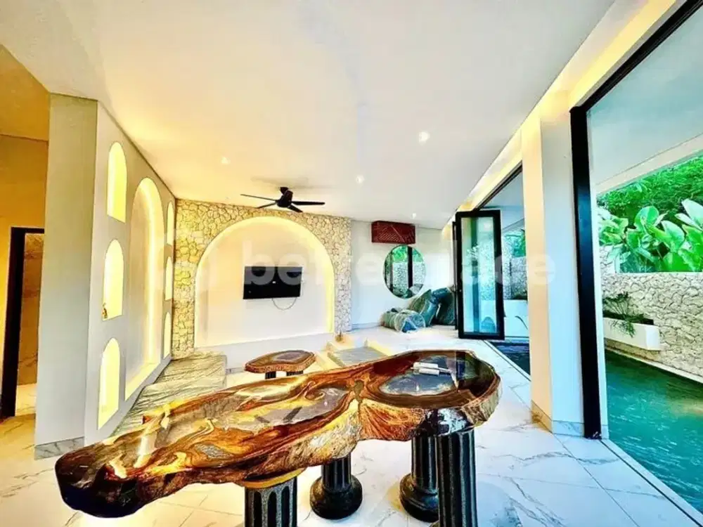 Experience Refined Coastal Luxury in South Bali with a Stunning Four-Bedroom Villa Featuring Rooftop Infinity Pool, Jacuzzi, Sauna, and Breathtaking S