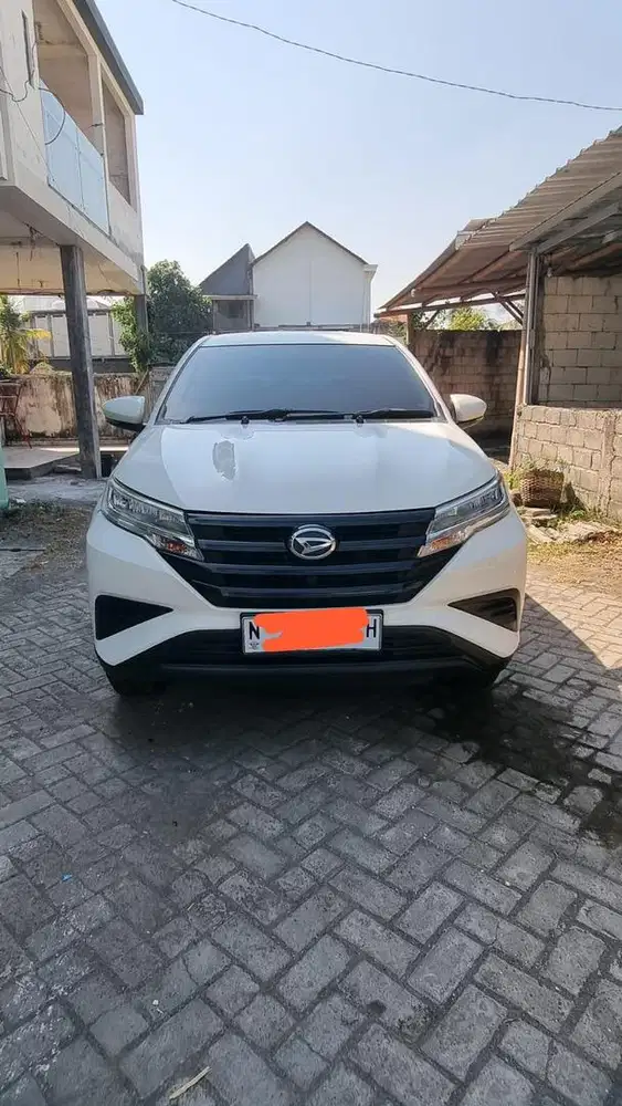 Terios manual warna putih