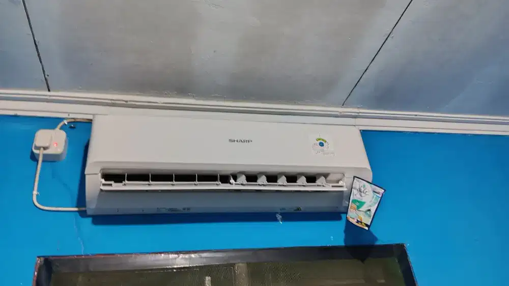AC SHARP 1/2 PK BARU PASANG 5 BULAN