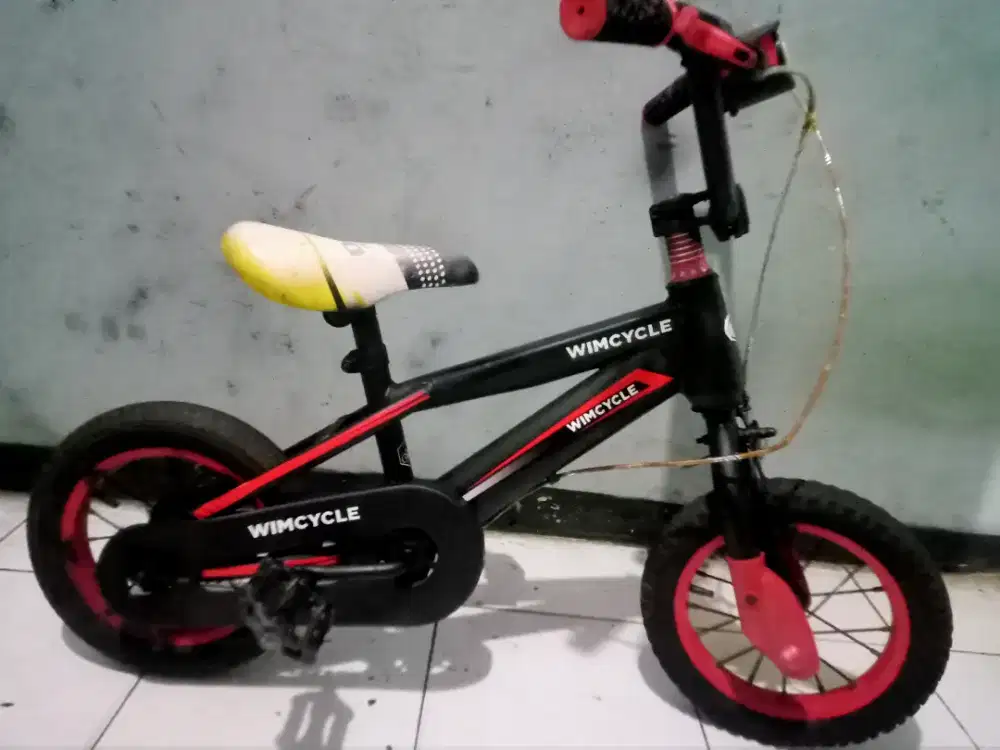 Dijual sepeda BMX merk WIMCYCLE ring 12 kondisi msih bagus Kker normal