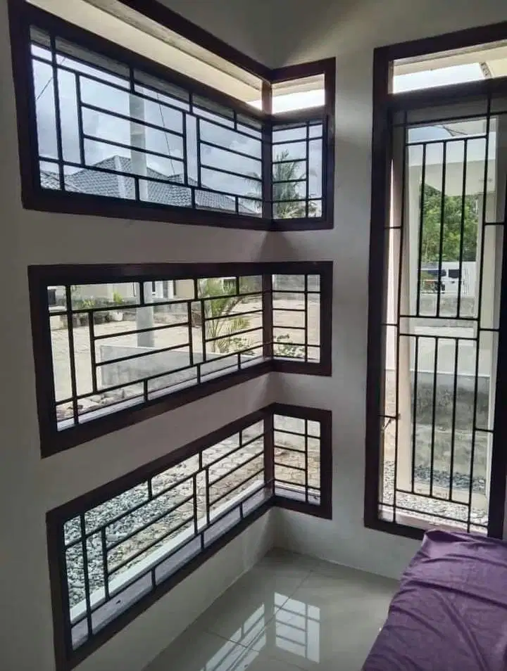 Terakis besi jendela rumah