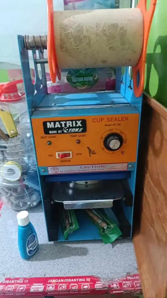 Cup sealer second
