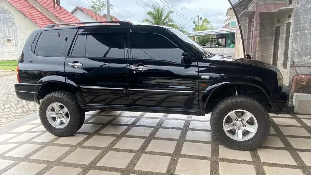 Grand escudo XL7 V6