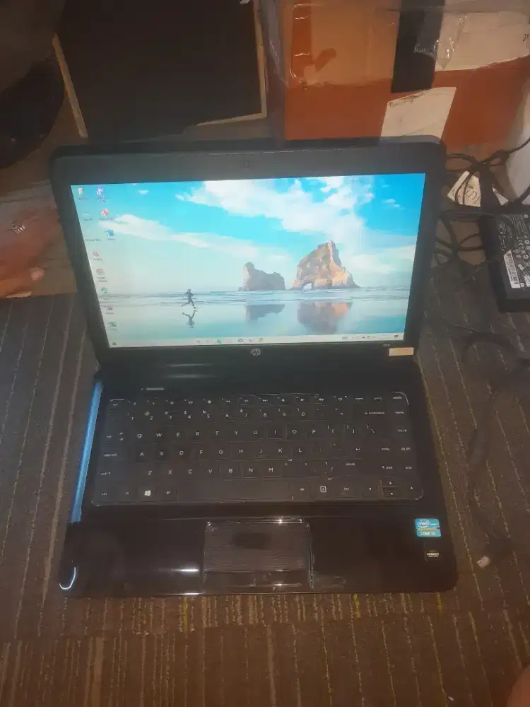 Laptop hp 1000 core i5 generasi 3 ram 4gb,hdd 500gb,batre aman