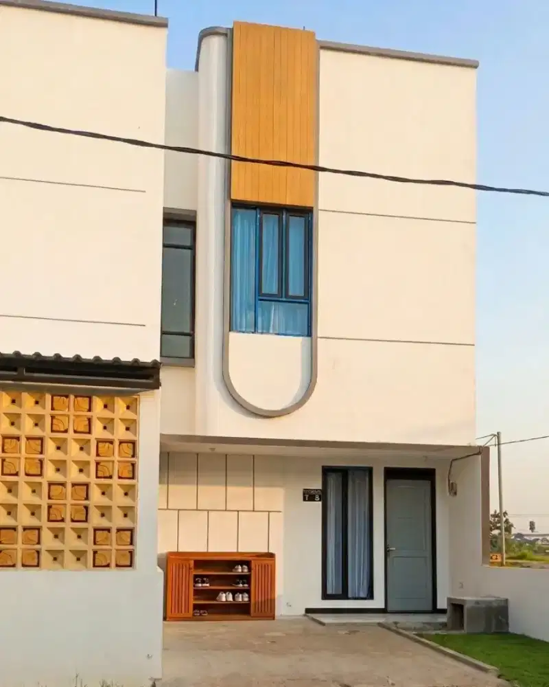Rumah kotemporer 2 lantai, hadap timur , legalitas shm di bandung