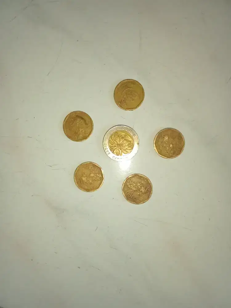 Koin Mahar pecahan seratus dan seribu rupiah