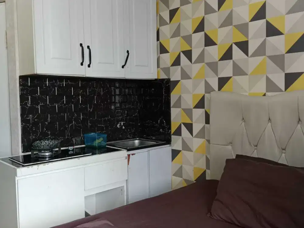 The green apartment pramuka city studio mall