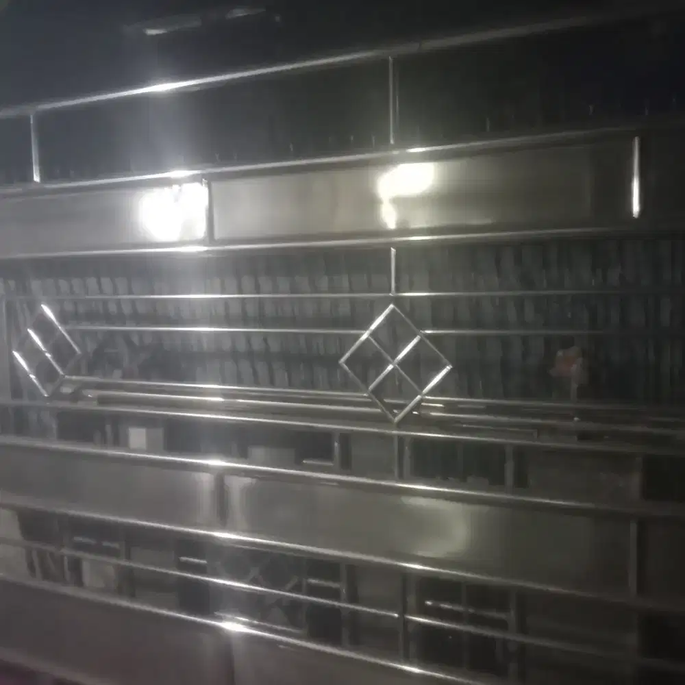 Pagar stainless dan pintu kecil nya