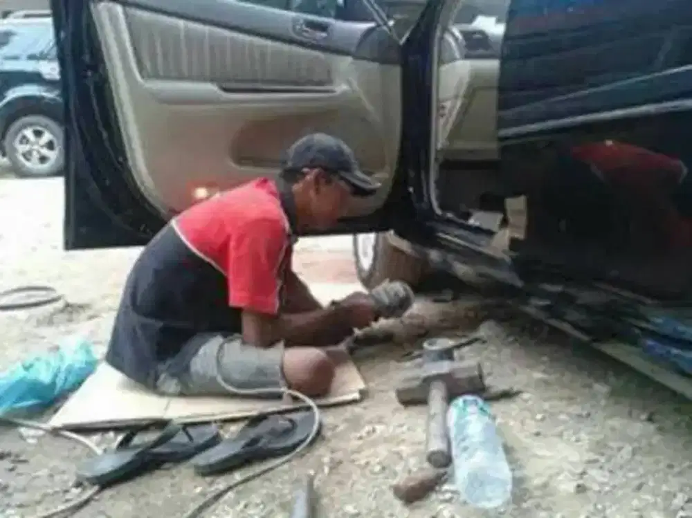 Tukang las ketok