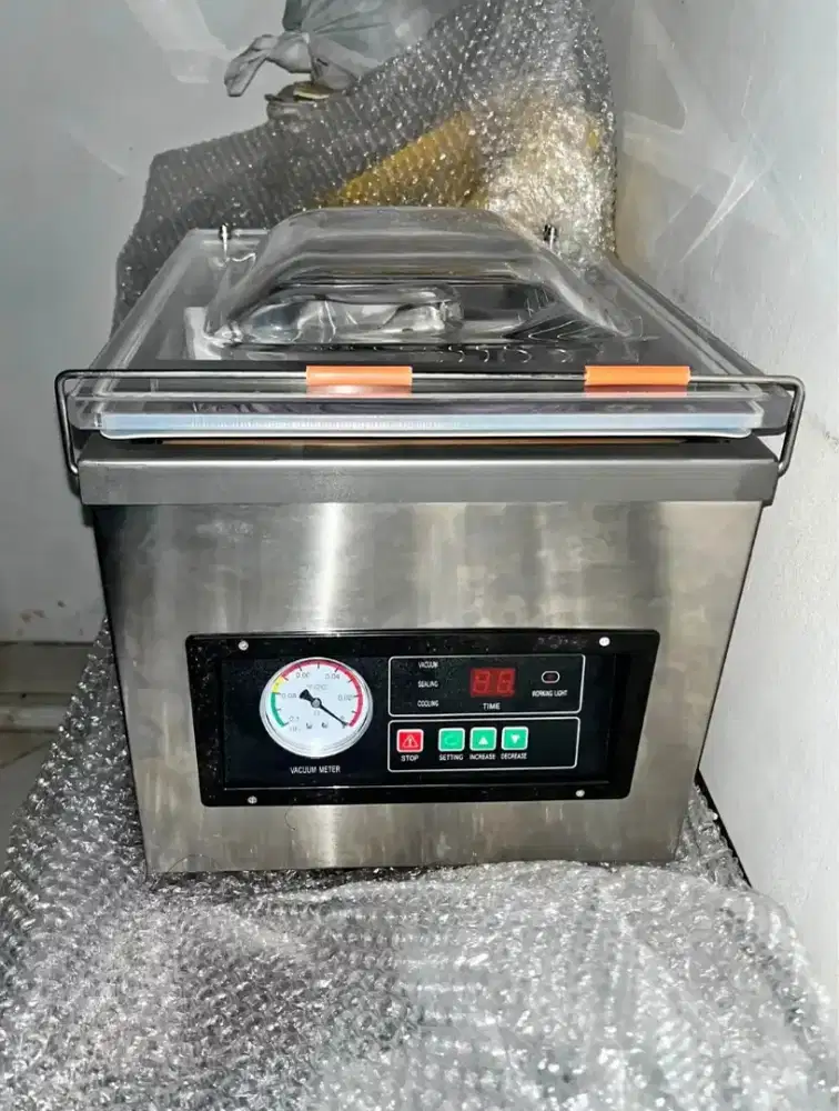 Mesin vacum sealer dan freezer