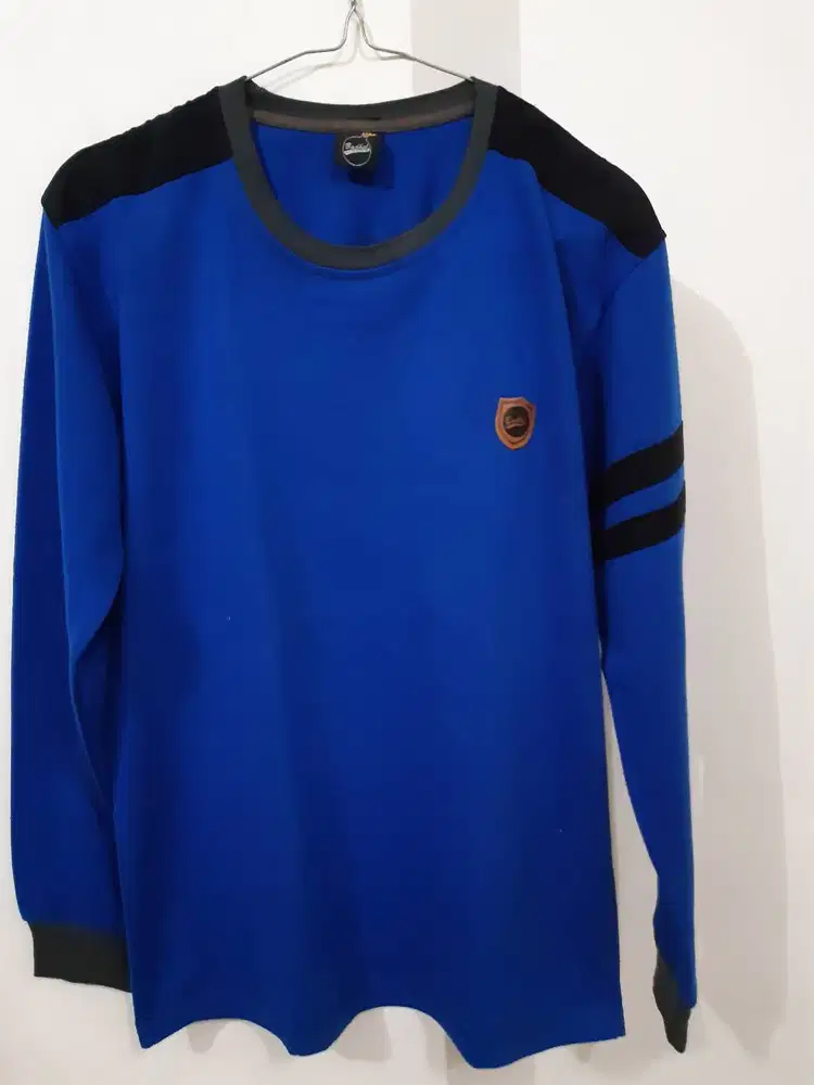 Kaos lengan panjang Merek Badhel warna biru tua dengan Size L
