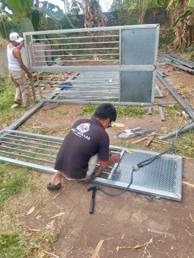 Tukang las kanopi pagar tralis mezanin dll