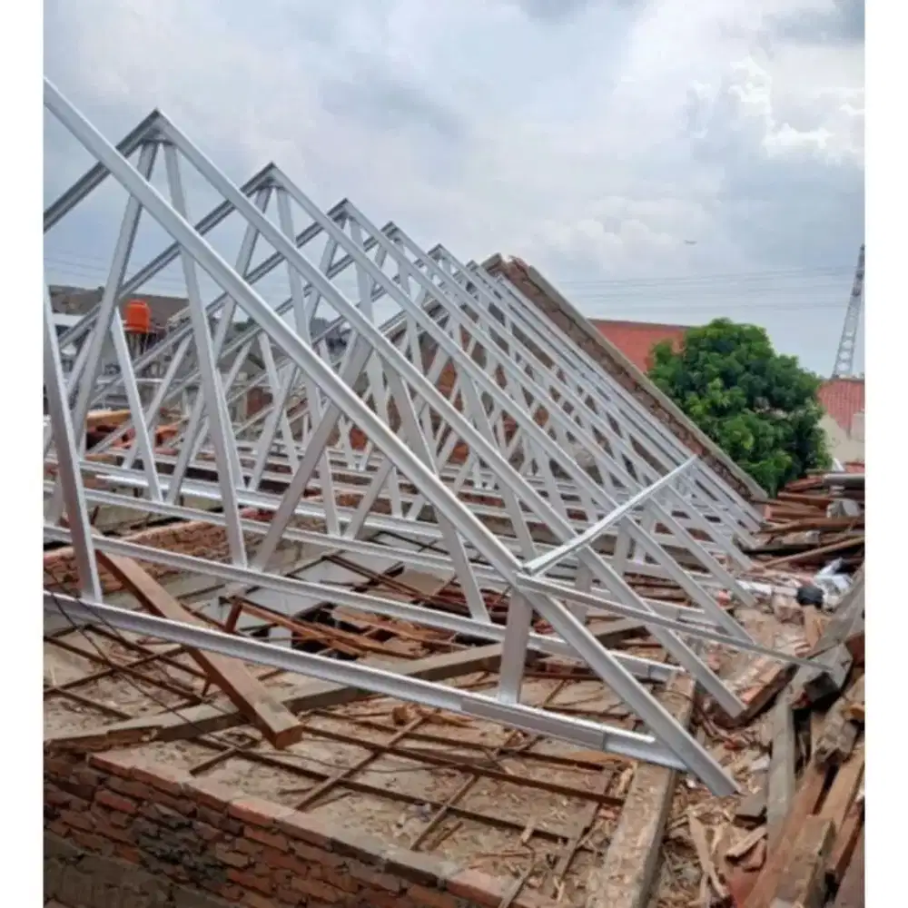 Pasang bajaringan bongkar pasang ah atap rumah