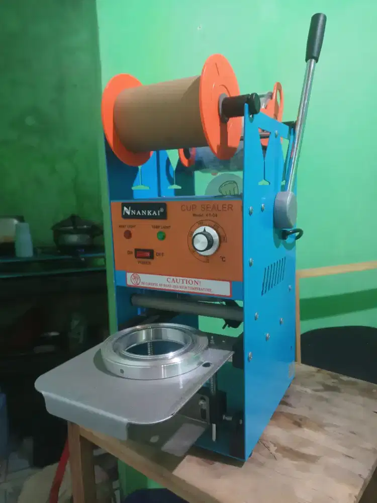 Mesin Press Minuman Manual