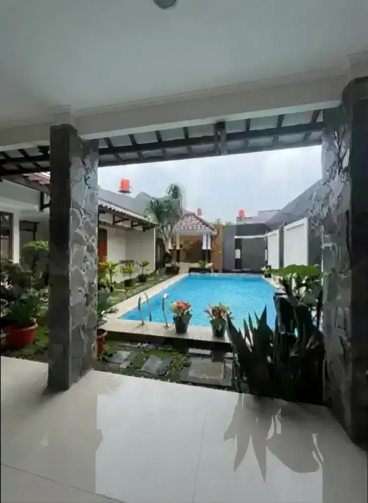 Jual rumah Jalan Raya Taman Yasmin kolam renang
