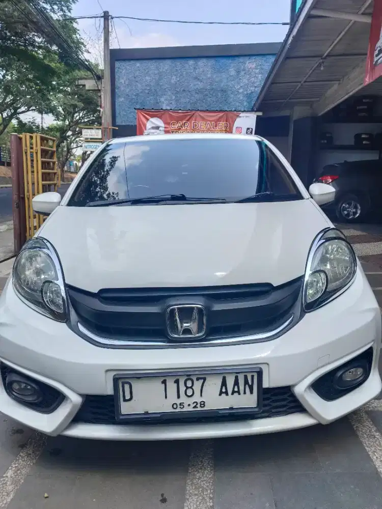 Bismillah numpang jual honda Brio 1,3 metic 2013 putihno D.