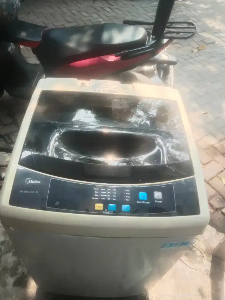 Mesin cuci otomatis 9 kilo