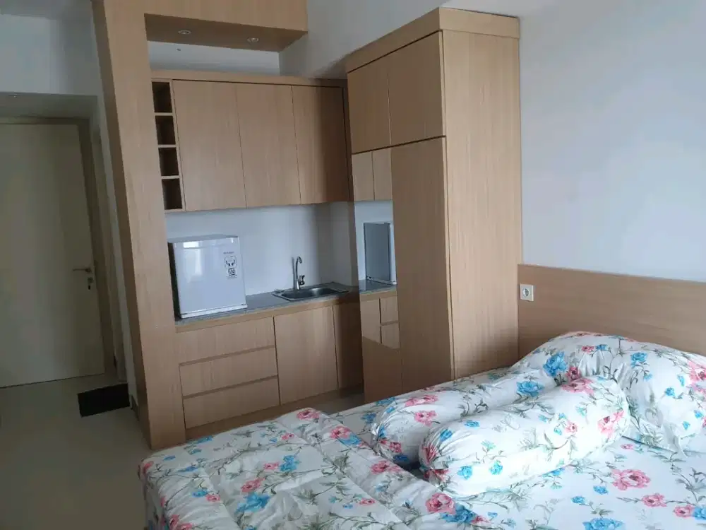 Disewakan Apartemen Anderson Studio LT9 Luas 27m View Pool Ada Balkon Connect Pakuwon Mall Surabaya Barat