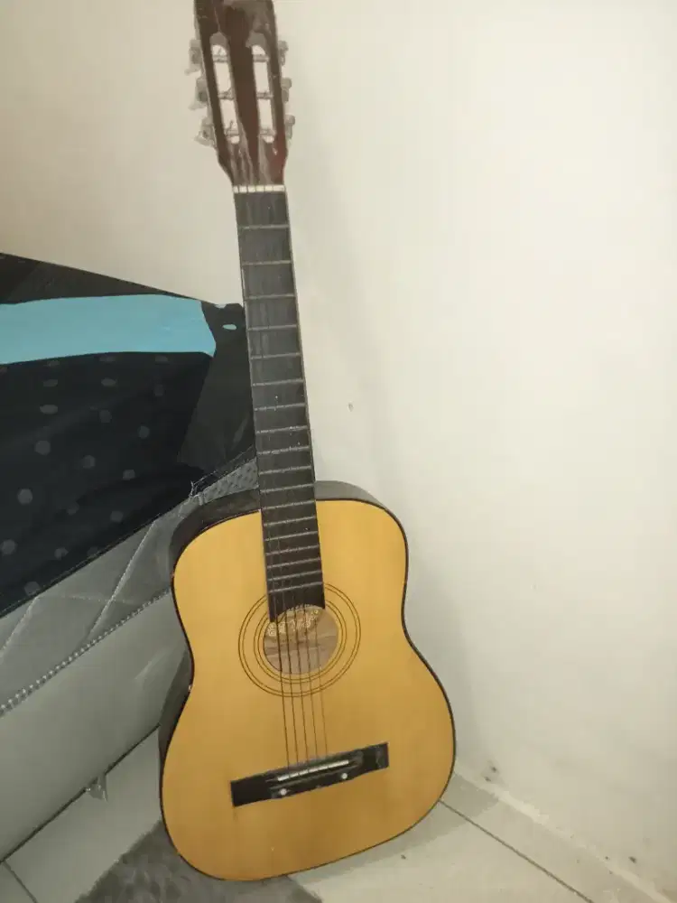 Gitar kapok pemakaian cewe