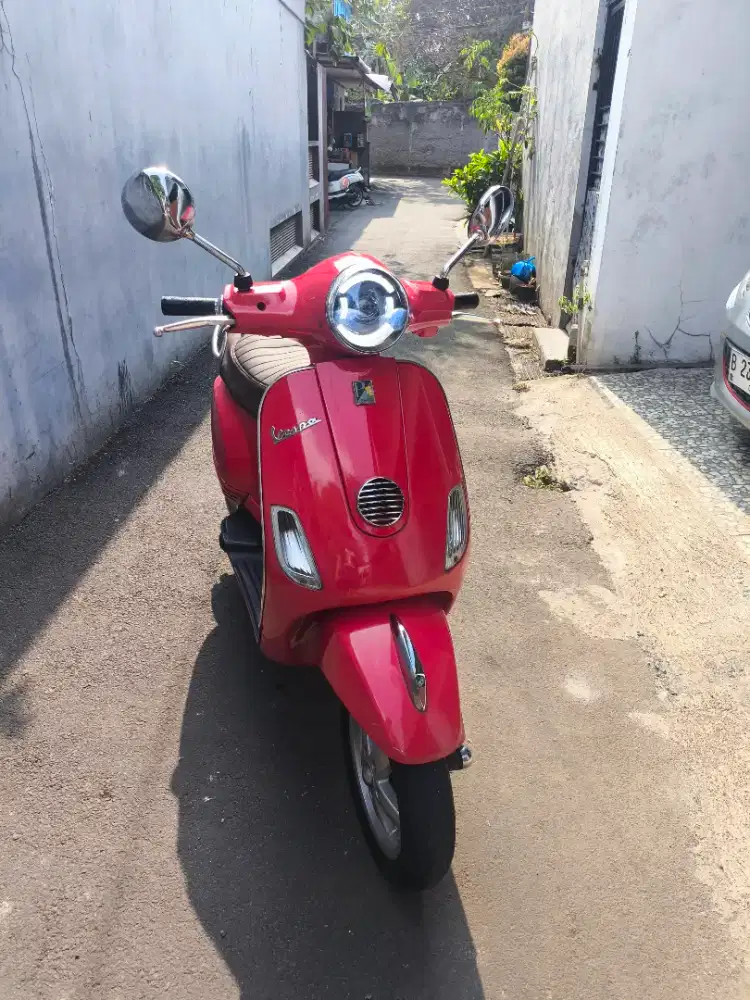 Vespa lx 150 ie 2v merah