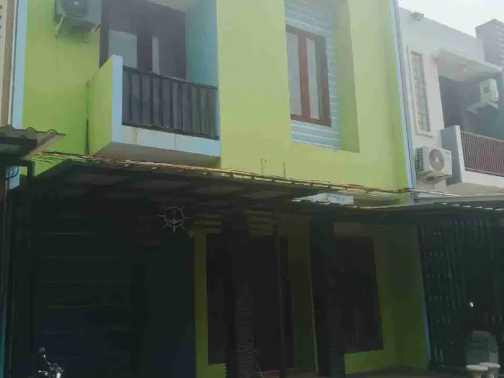 Rumah minimalis bebas banjir dalam cluster di Bintara raya-