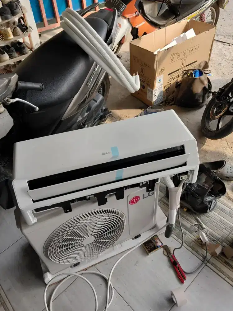 Service AC,mesin cuci,kulkas bongkar pasang ac