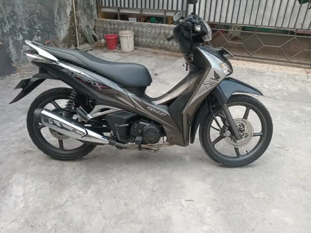 Supra X 125 PGM-Fi Terawat