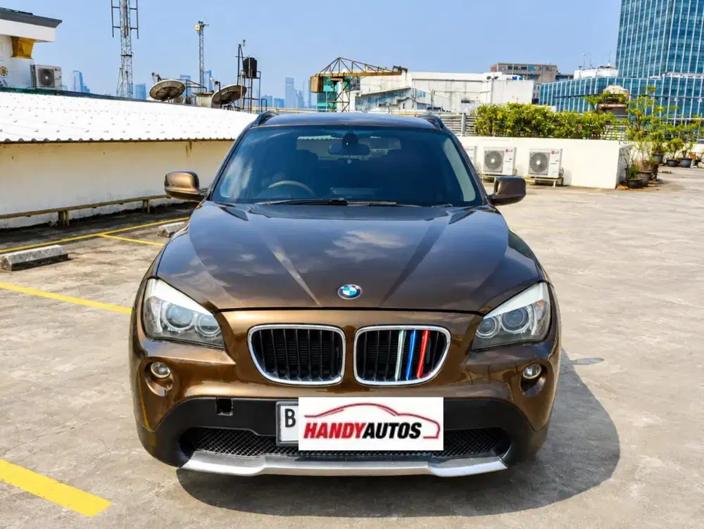BMW X1 Executive 2011 Automatic Coklat Metalik