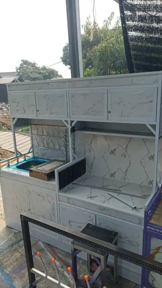 Atang kompor berbahan acp