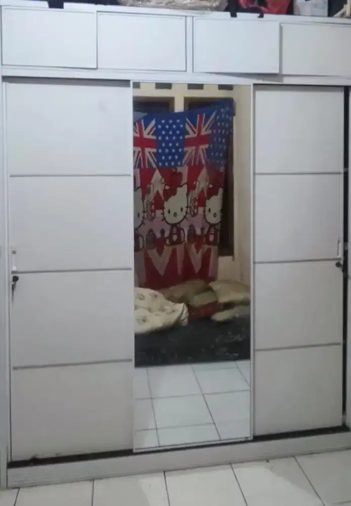 Lemari 3pintu sleding