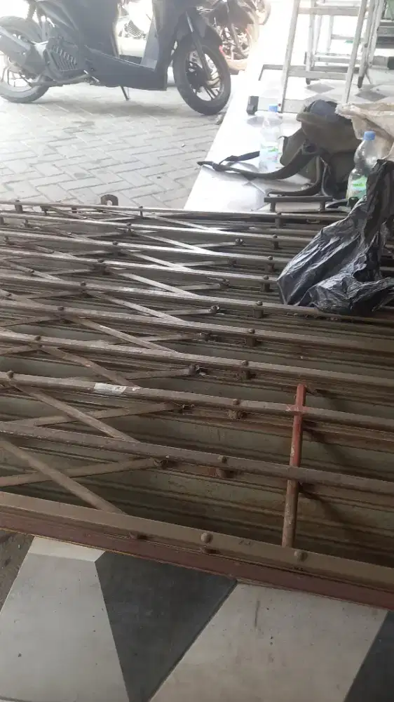 Tukang perbaikan pintu rolling door dan folding gate