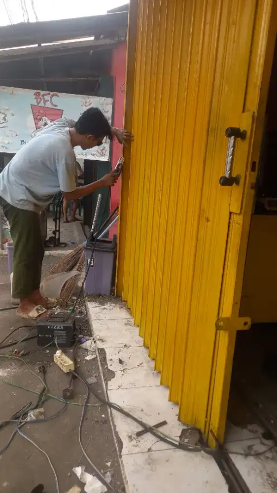 Tukang spesialis service rolling door folding gate