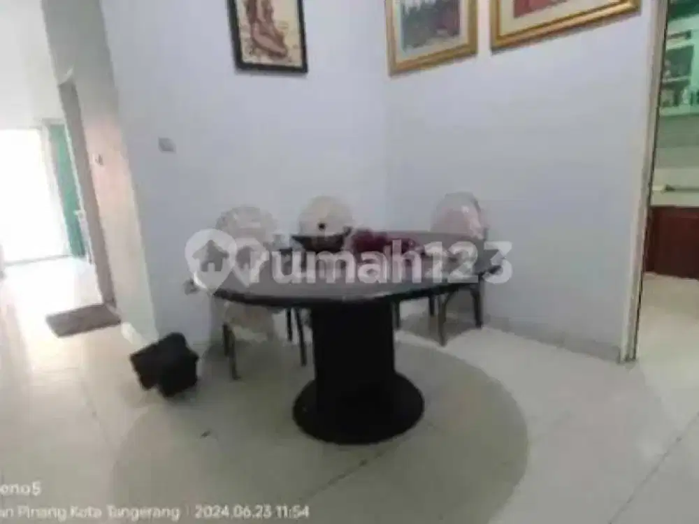 Rumah 2 Lantai Bagus Unfurnished SHM di Cluster Madrid , Tangerang