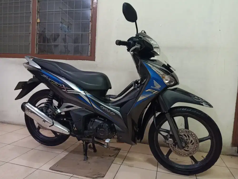 Honda SUPRA X 125 HELM IN PGM-FI 2019 BL 3 ( GRESS / TERAWAT )