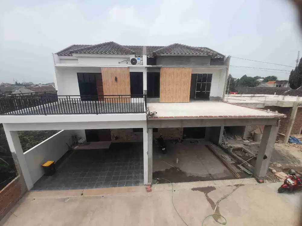 Rumah cluster istimewa dekat LRT Jatibening full bata merah harga 1M an