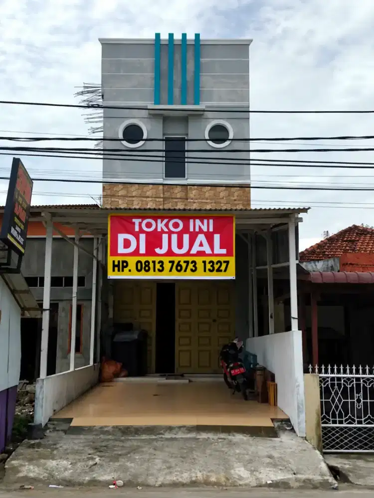 ruko 2 lantai dengan carport