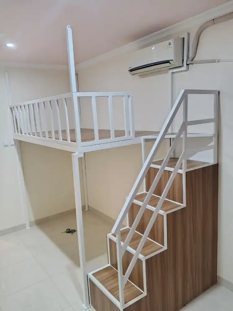 Mezzanine bed tempat tidur