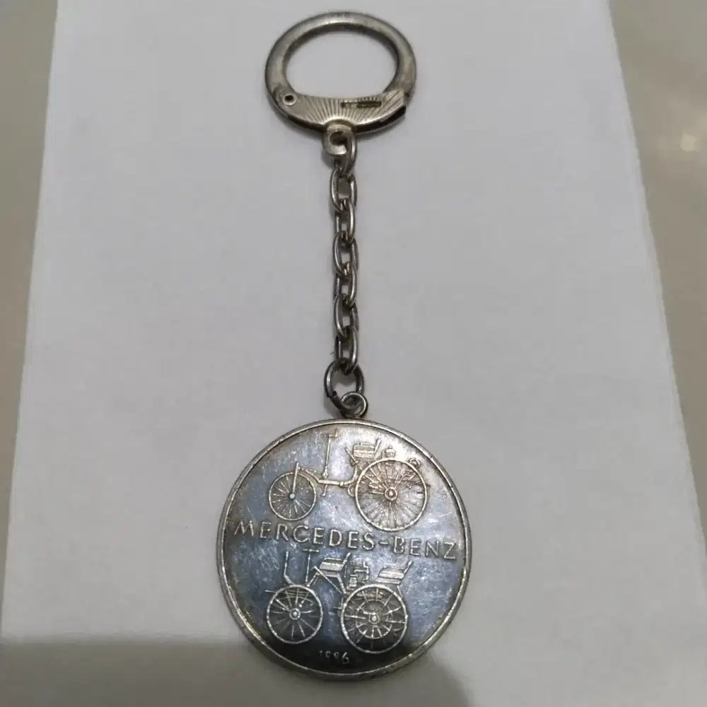 Gantungan Coin perak.
