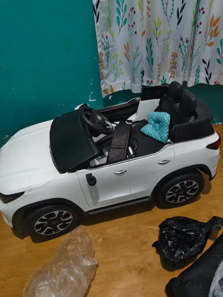 Mobil Listrik Maenan
