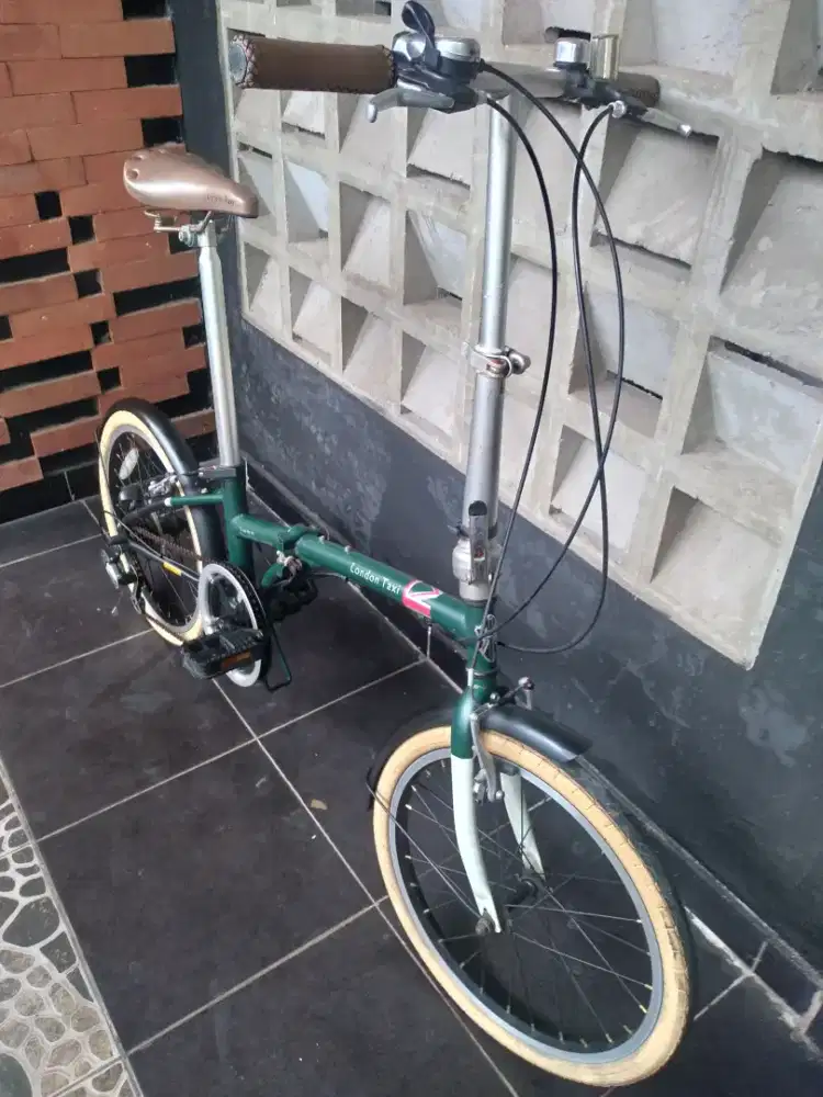 london taxi sepeda lipat