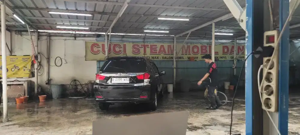 Kasir cucian mobil motor