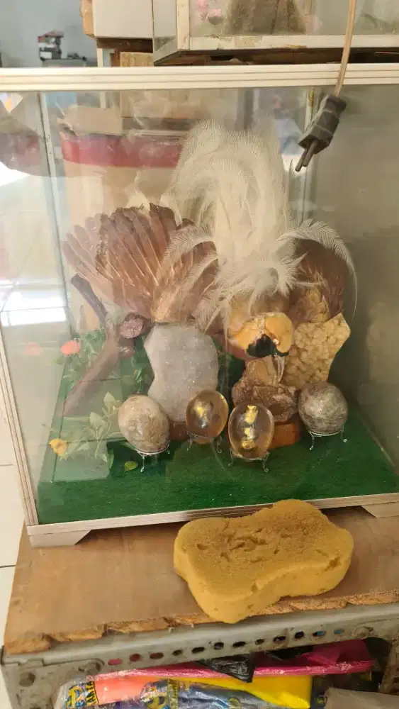 Dekorasi pajangan burung dan batu