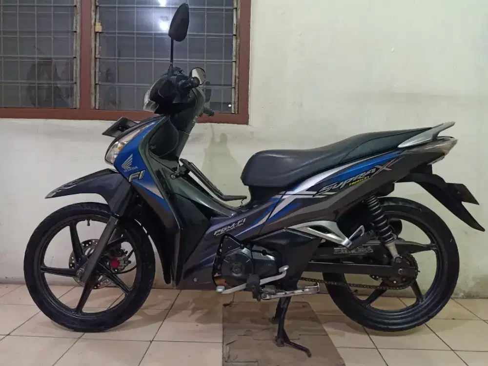 Honda SUPRA X 125 HELM IN PGM-FI 2019 BL 3 ( GRESS / TERAWAT )