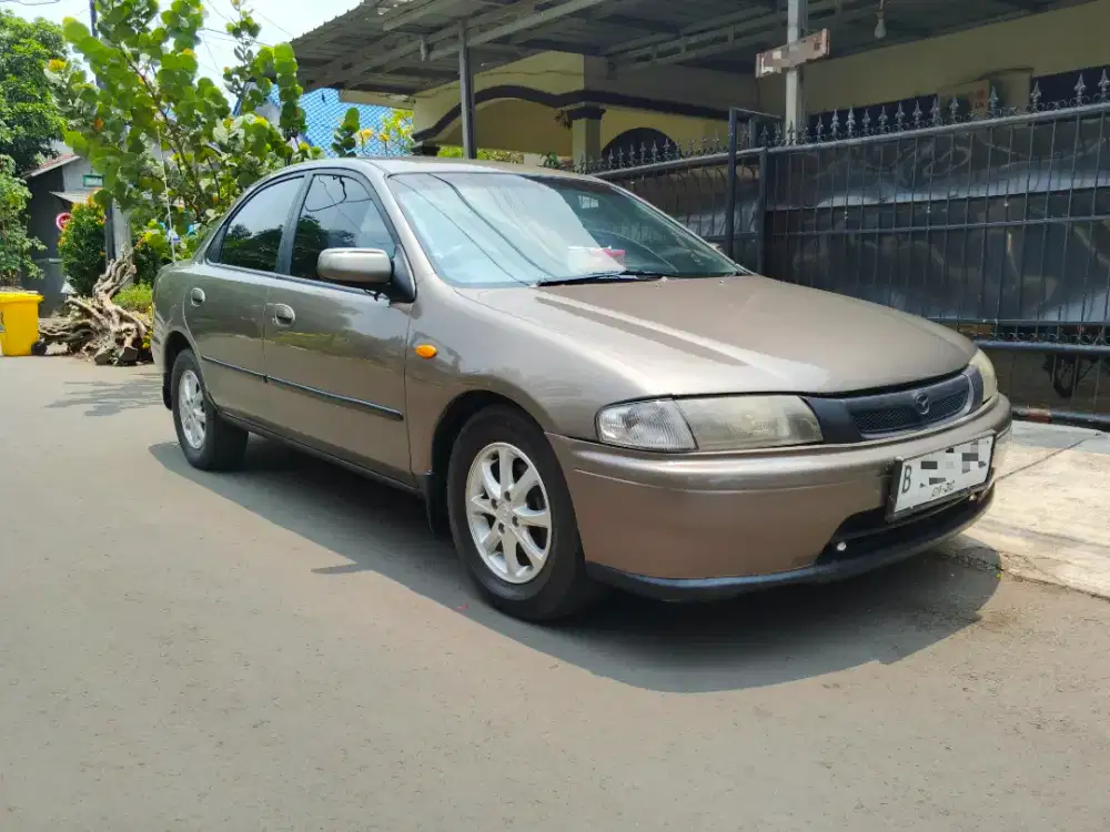 MAZDA FAMILIA 1.6 KONDISI ISTIMEWA PAJAK BARU